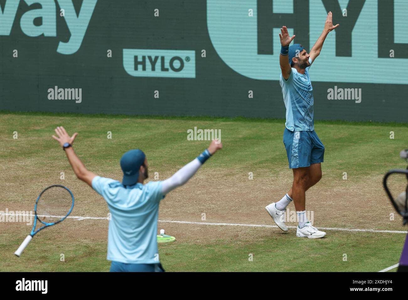 Halle, Germany. 23rd June, 2024. Tennis: ATP Tour, doubles, final, Bolelli and Vavassori (Italy) - Krawietz and Pütz (Germany). Simone Bolelli (above) and Andrea Vavassori are delighted with their victory in the final. Credit: Friso Gentsch/dpa/Alamy Live News Stock Photo