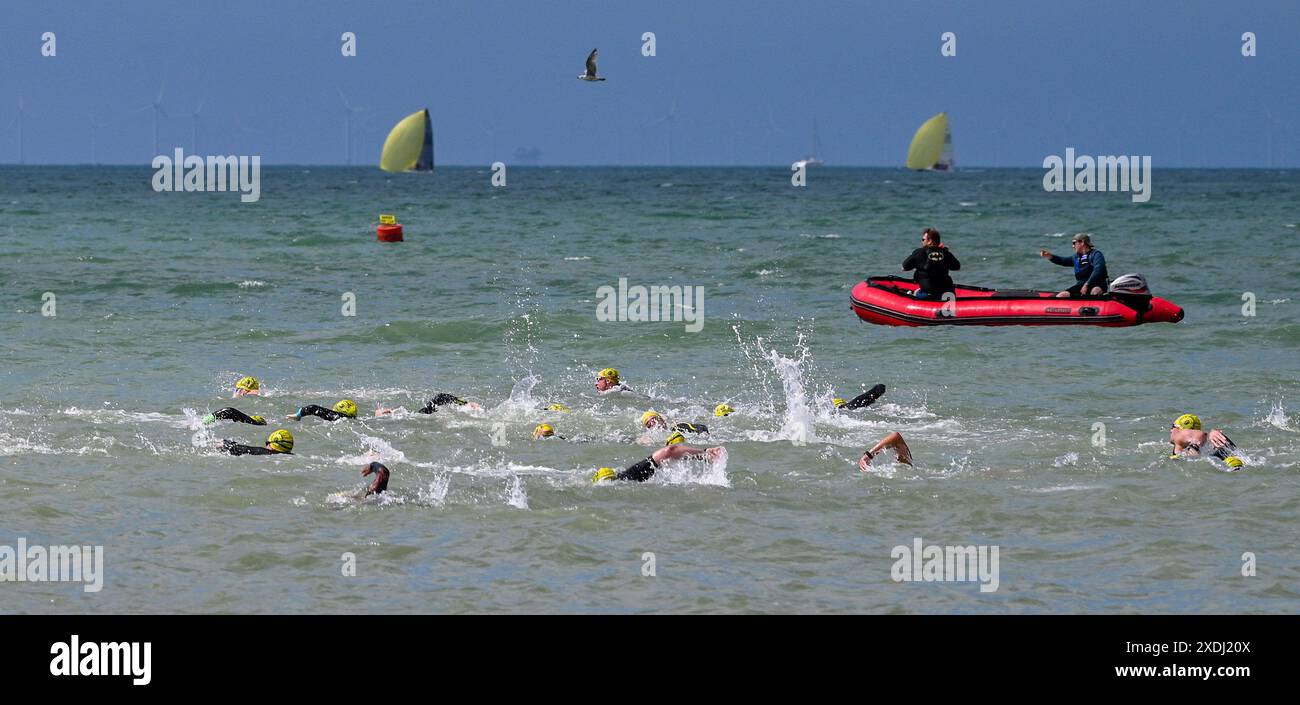 Brighton UK 23rd June 2024 Competitors set off in the annual Brighton Pier to Pier swimming