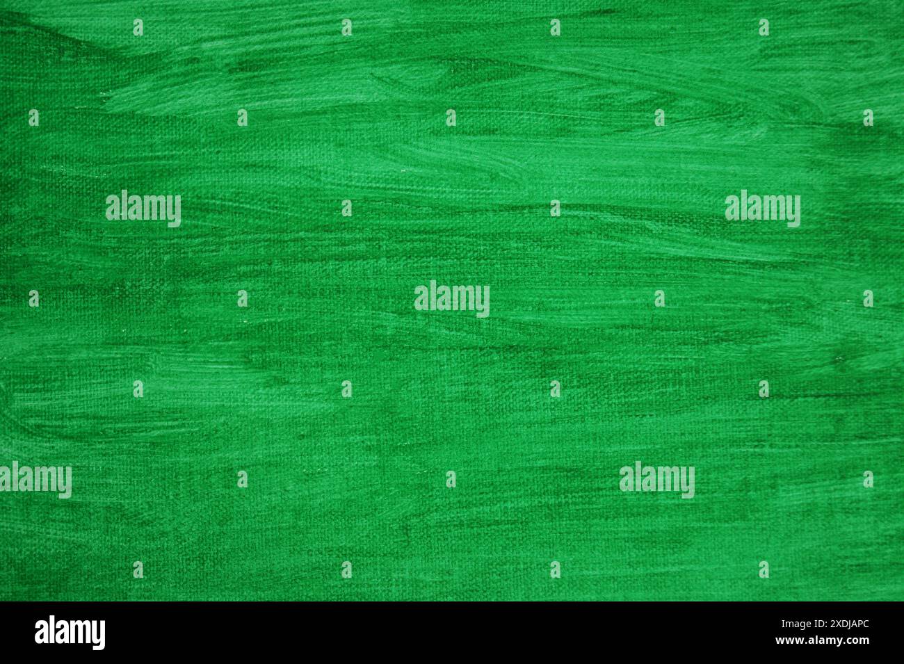 Green painted background with brush strokes. Painting canvas texture. Stock Photo