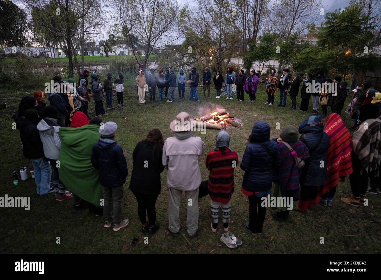 Bonfire Communication Inca People gather around a bonfire to celebrate the winter solstice and ...