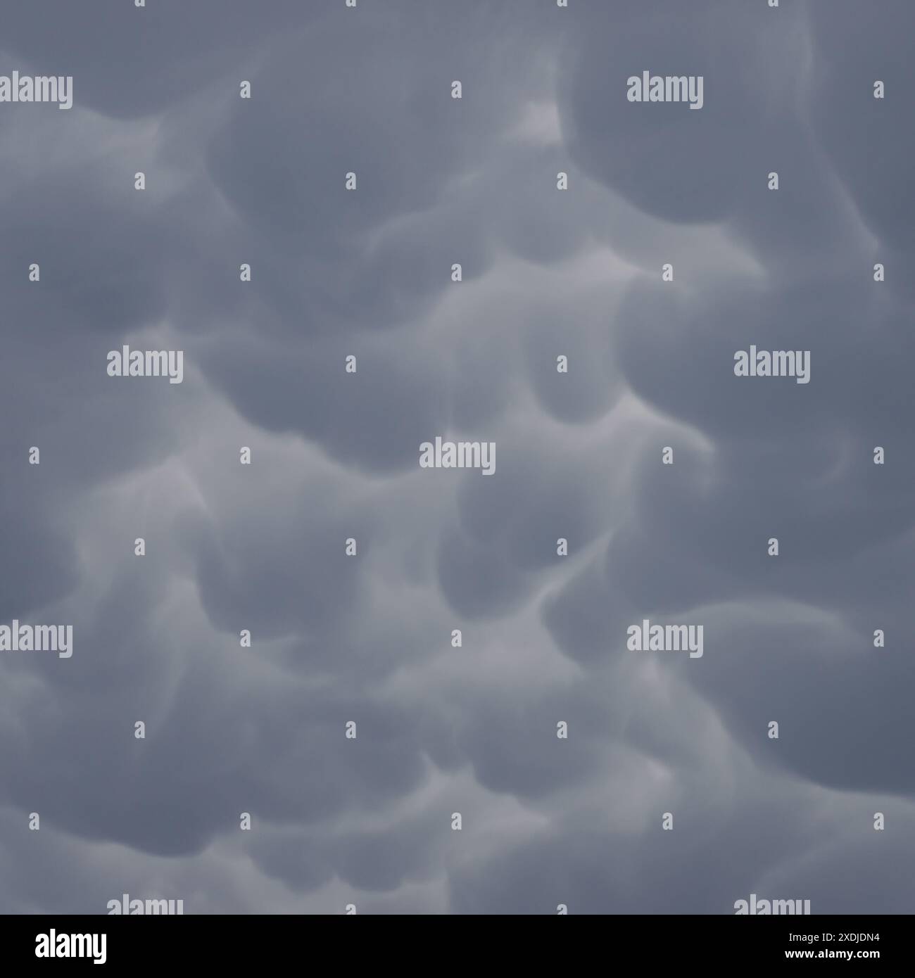 Mammatus clouds in the sky Stock Photo
