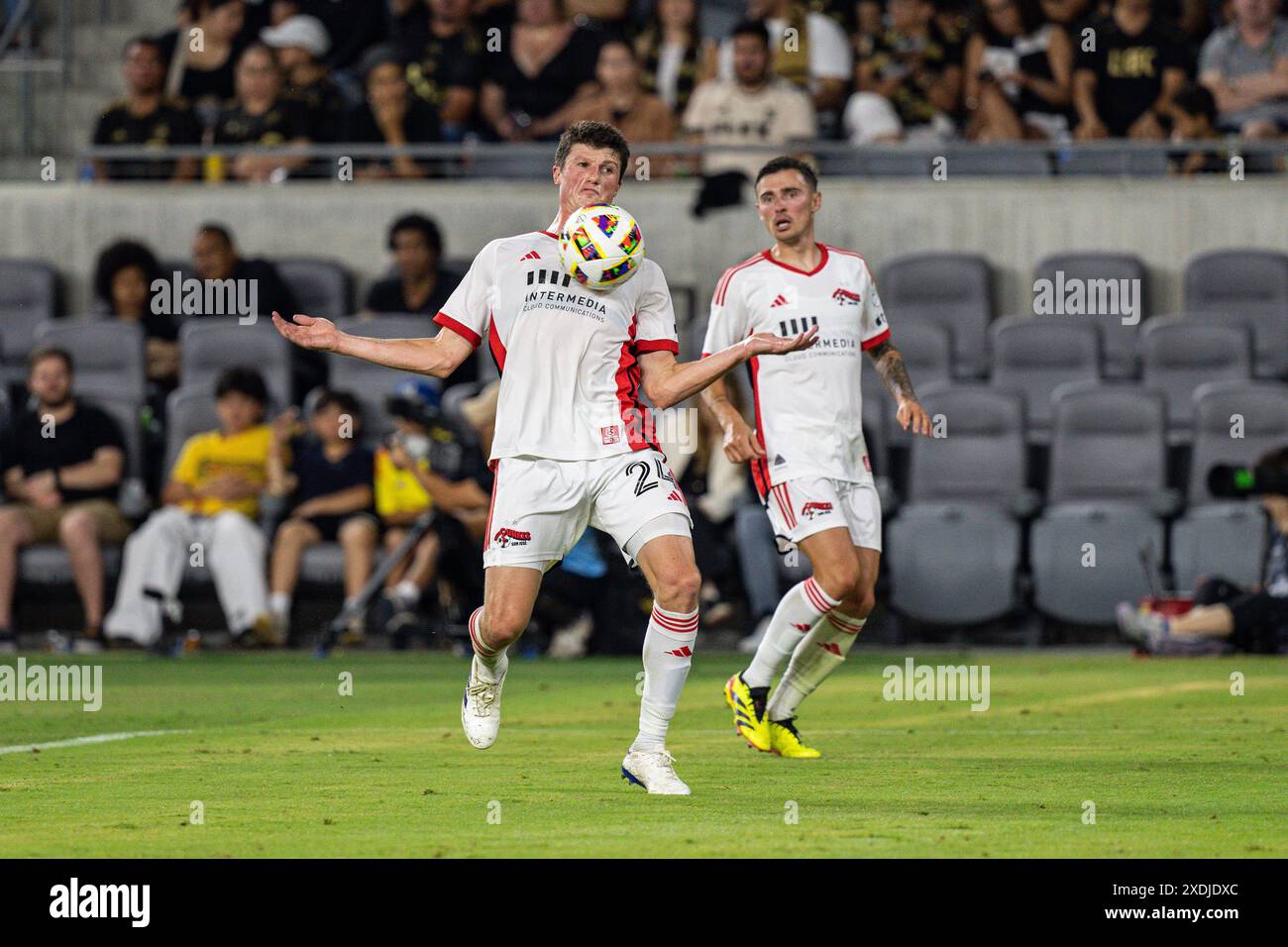 San Jose Earthquakes defender Daniel Munie (24) chest a ball to the