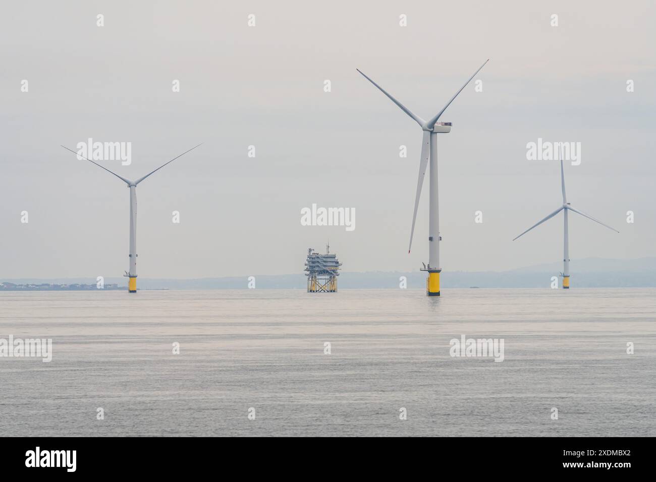 Irish Sea near Merseyside, England, UK - May 17, 2023: An oil rig and ...