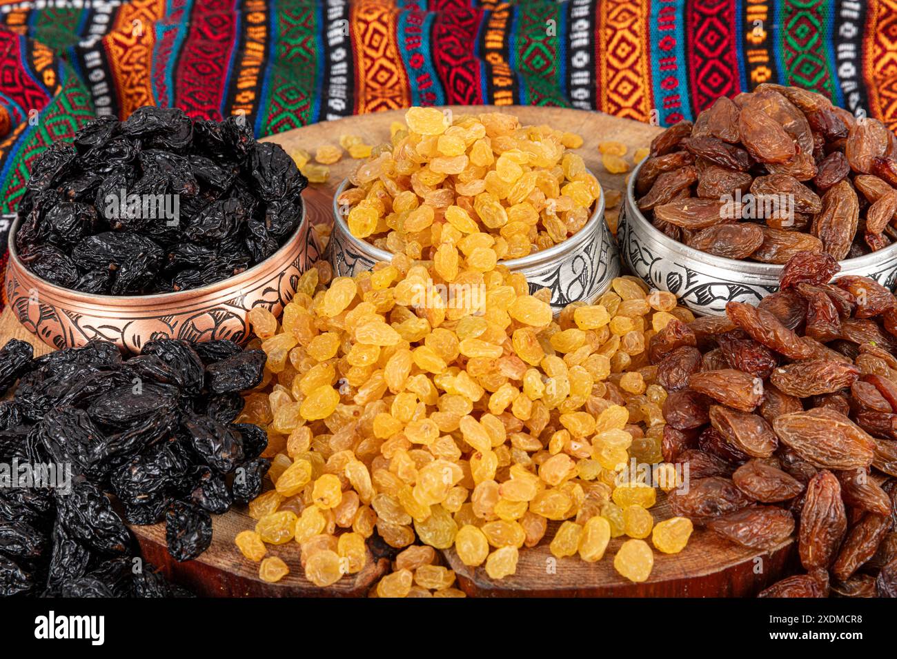 Collection of raisins that offers a vibrant and nutritious array. Three ...