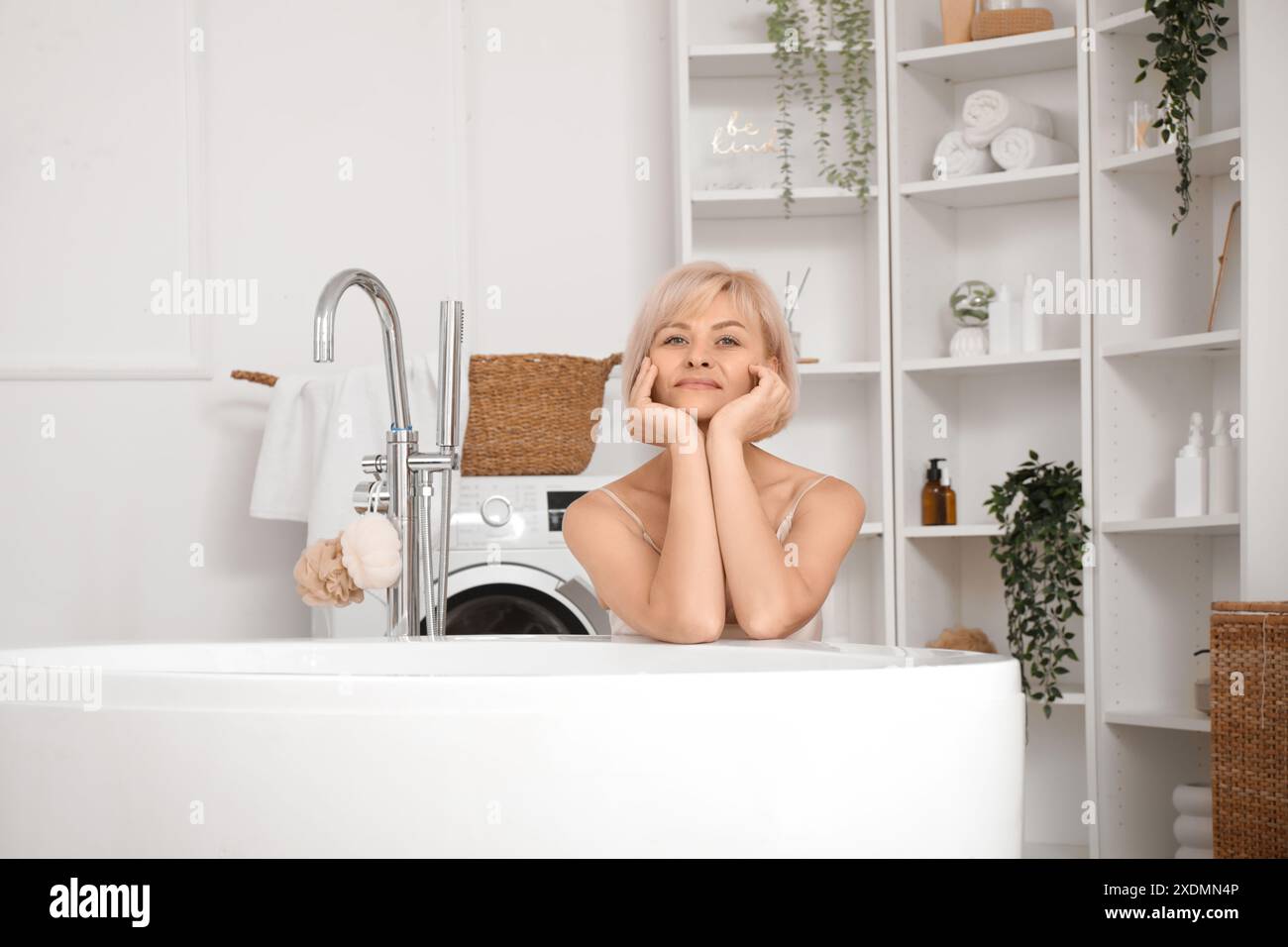 Woman middle aged bathtub hi-res stock photography and