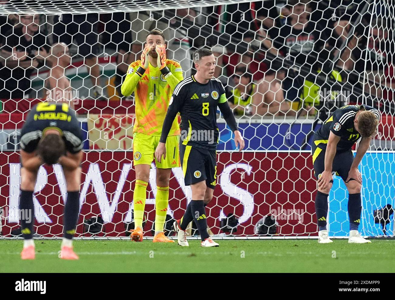 Scotland's Callum McGregor reacts after exiting the tournament