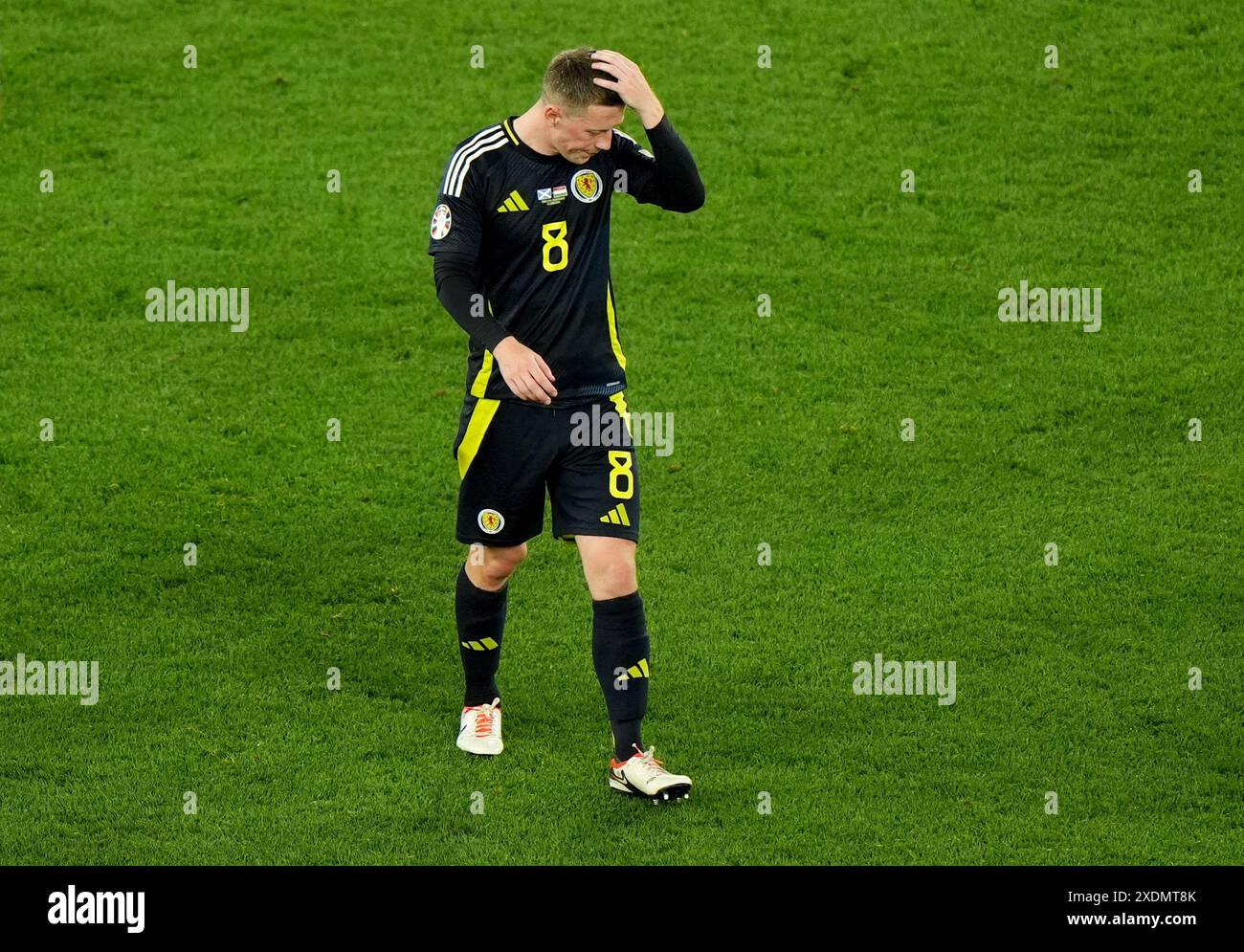Scotland's Callum McGregor shows his dejection after the UEFA Euro 2024
