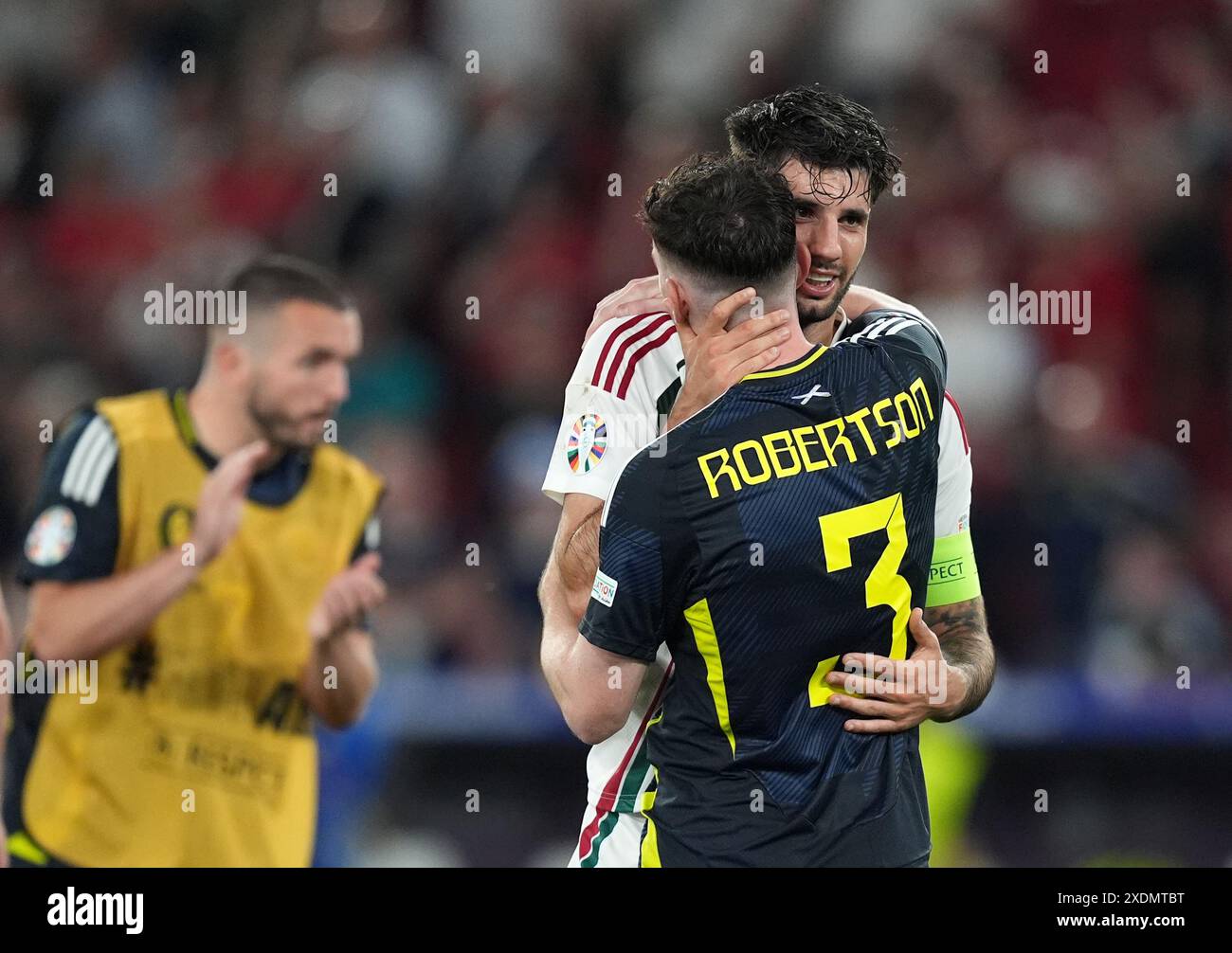 Hungary's Dominik Szoboszlai greets Scotland's Andrew Robertson