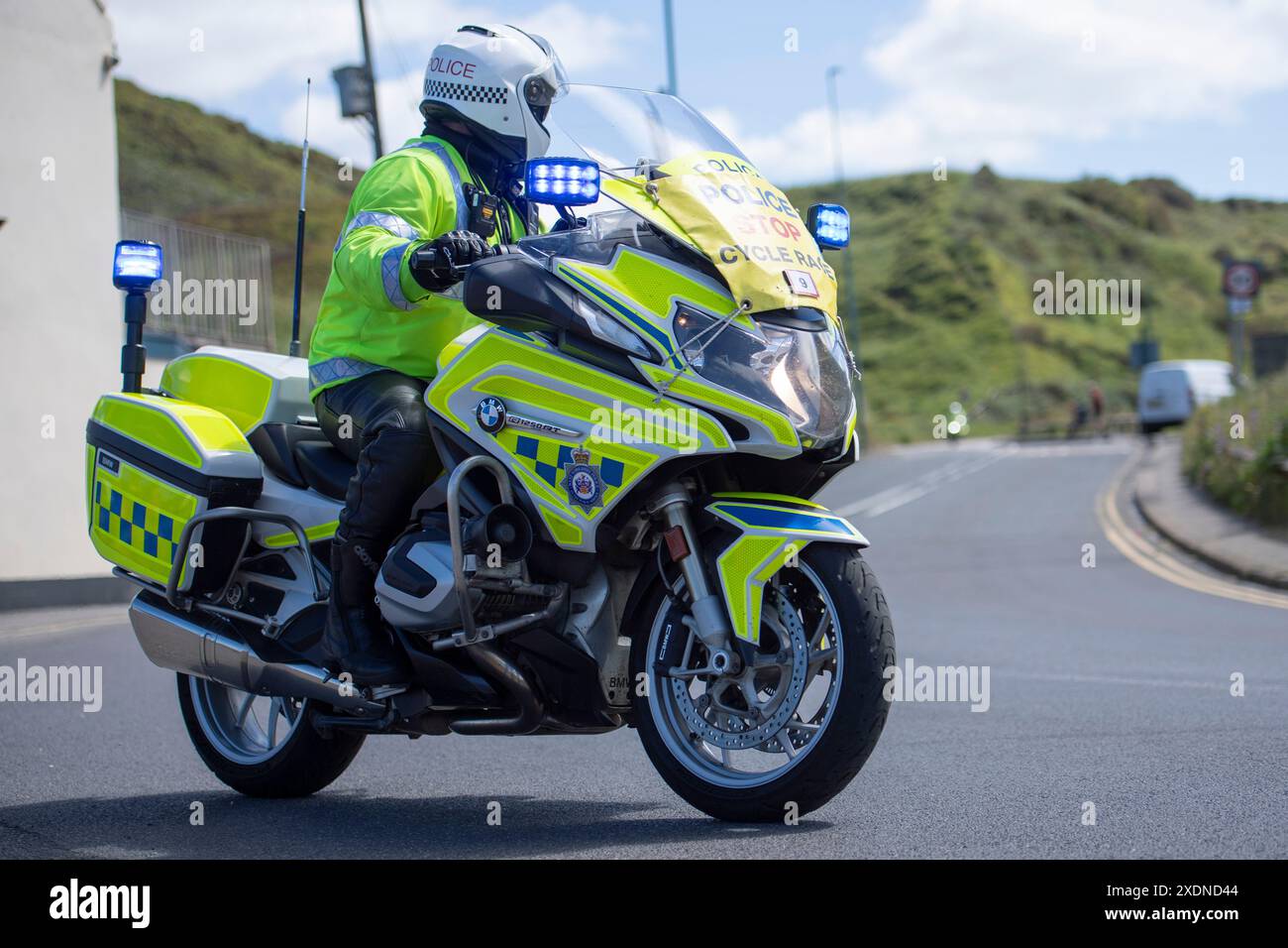 Despatch Cop Police despatch support rider during the British National Road Cycling ...