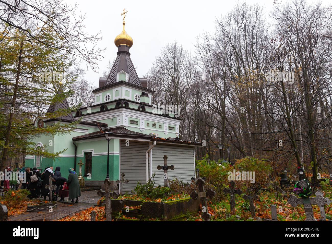 Saint-Petersburg, Russia - October 28, 2014: People are near the chapel of St. Blessed Xenia at the Smolensky Cemetry Stock Photo