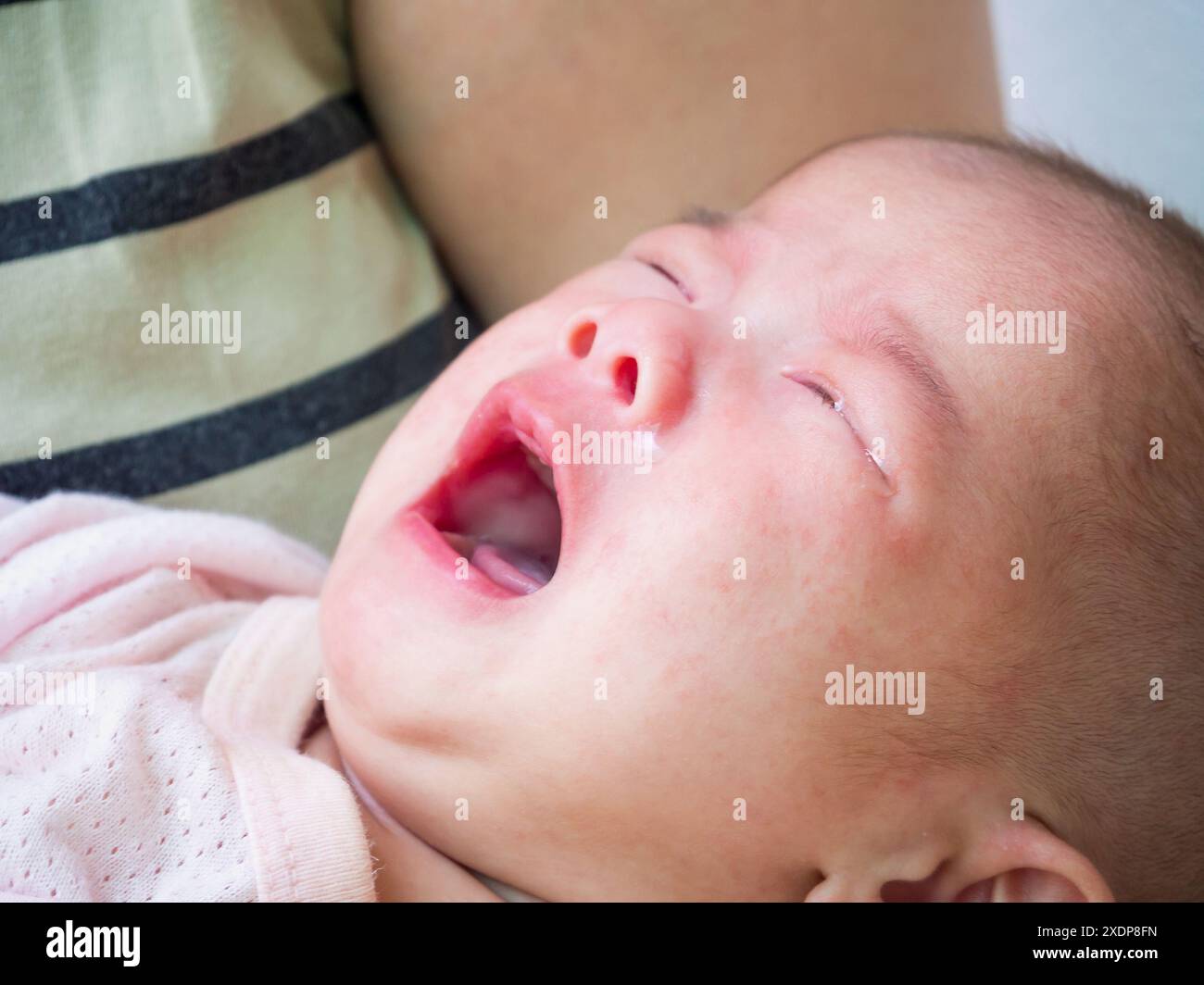newborn baby girl crying Stock Photo - Alamy