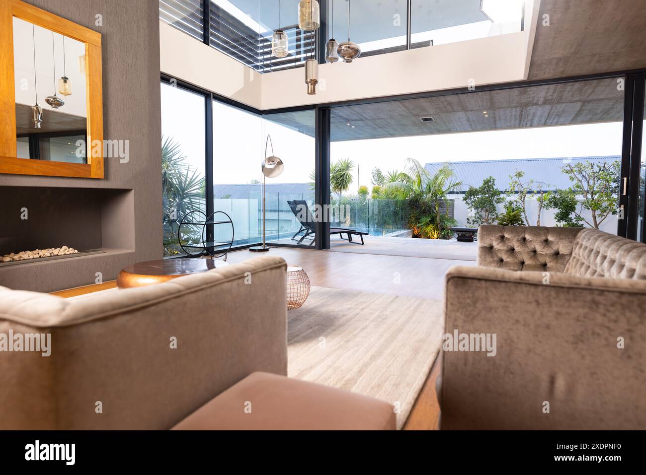 Gallery Detail: Modern Living Room With Large Windows Stylish Furniture And Outdoor