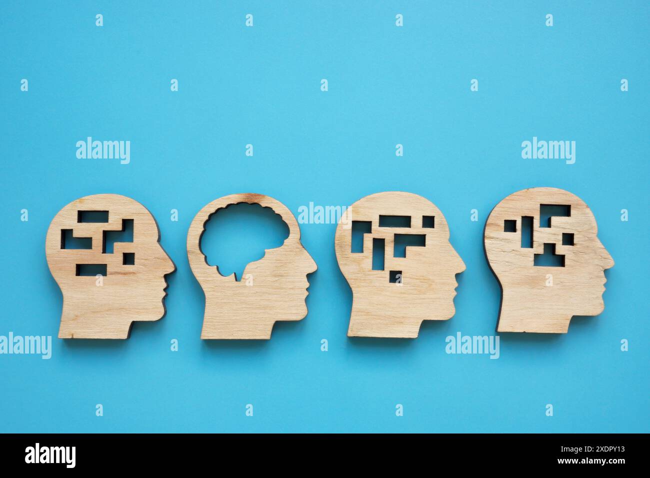 Lateral thinking or emotional intelligence. Models of the head with the brain. Stock Photo