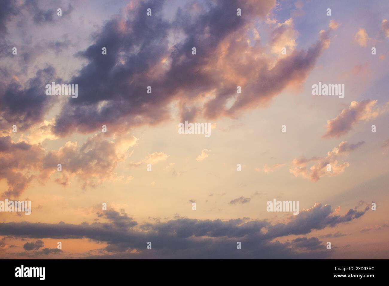 cloudy weather meteorology background. cumulus clouds on the blue sky blown by the wind. epic evening Stock Photo