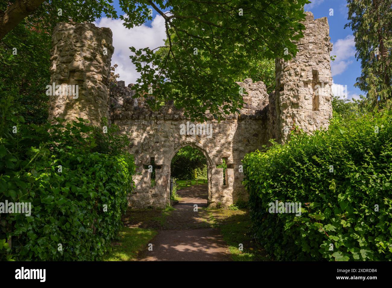 Castle Grounds, a public park in Reigate, Surrey, UK. While the castle no longer exists, a mock medieval gateway was built over the ruins in 1777. Stock Photo