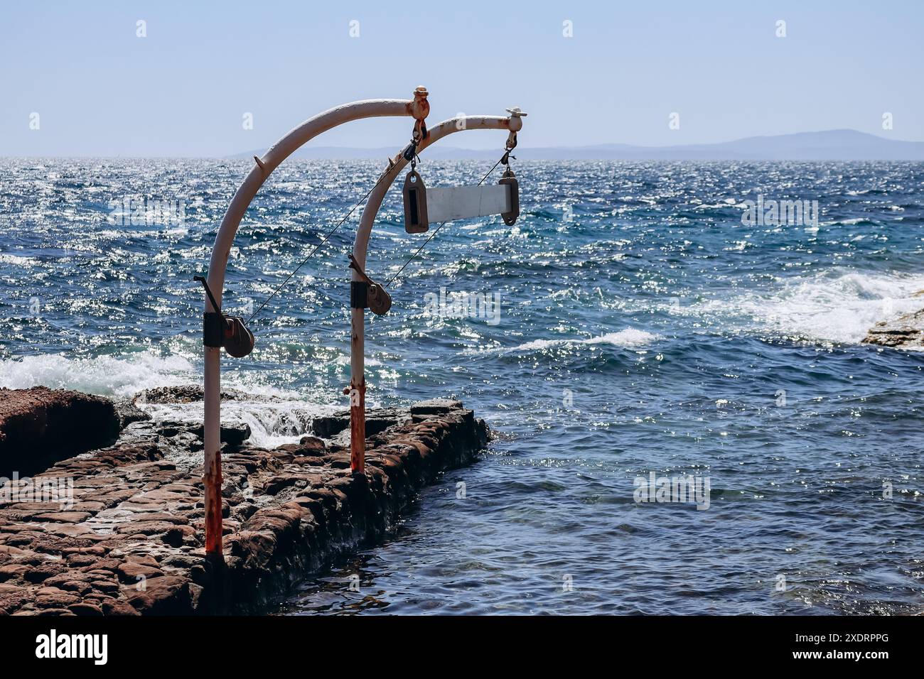 Crane lifting small boat hi-res stock photography and images - Alamy