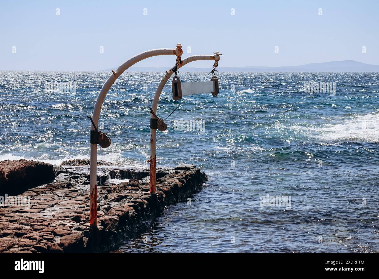 Crane lifting small boat hi-res stock photography and images - Alamy