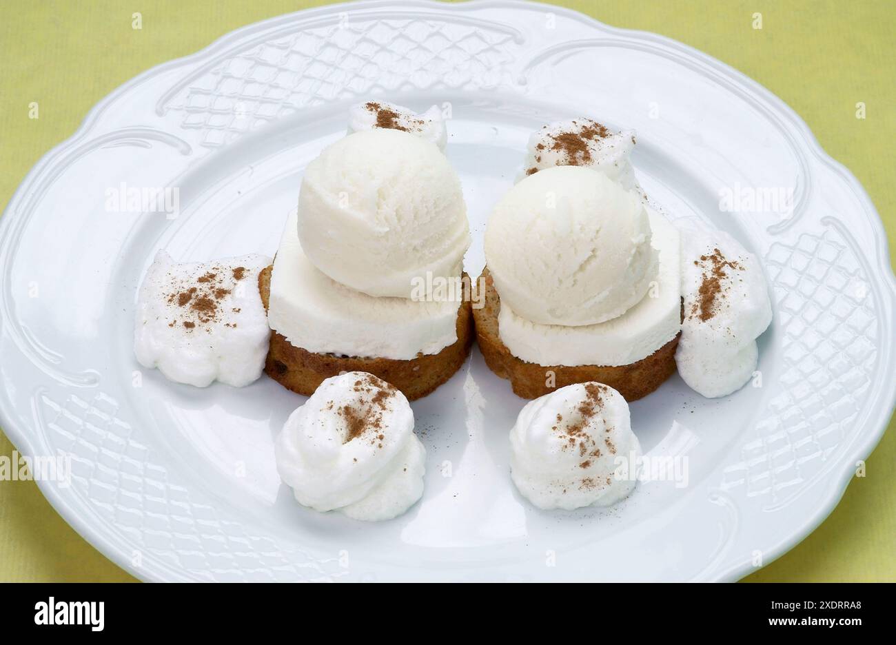 Lime (Water, Fructose, Lime Juice, Peel of Lime) and ´Leche Merengada´ (Milk, Fructose, Egg Whites, Cinnamon, Lemon Peel) sorbet, Desert, Escuela de C Stock Photo