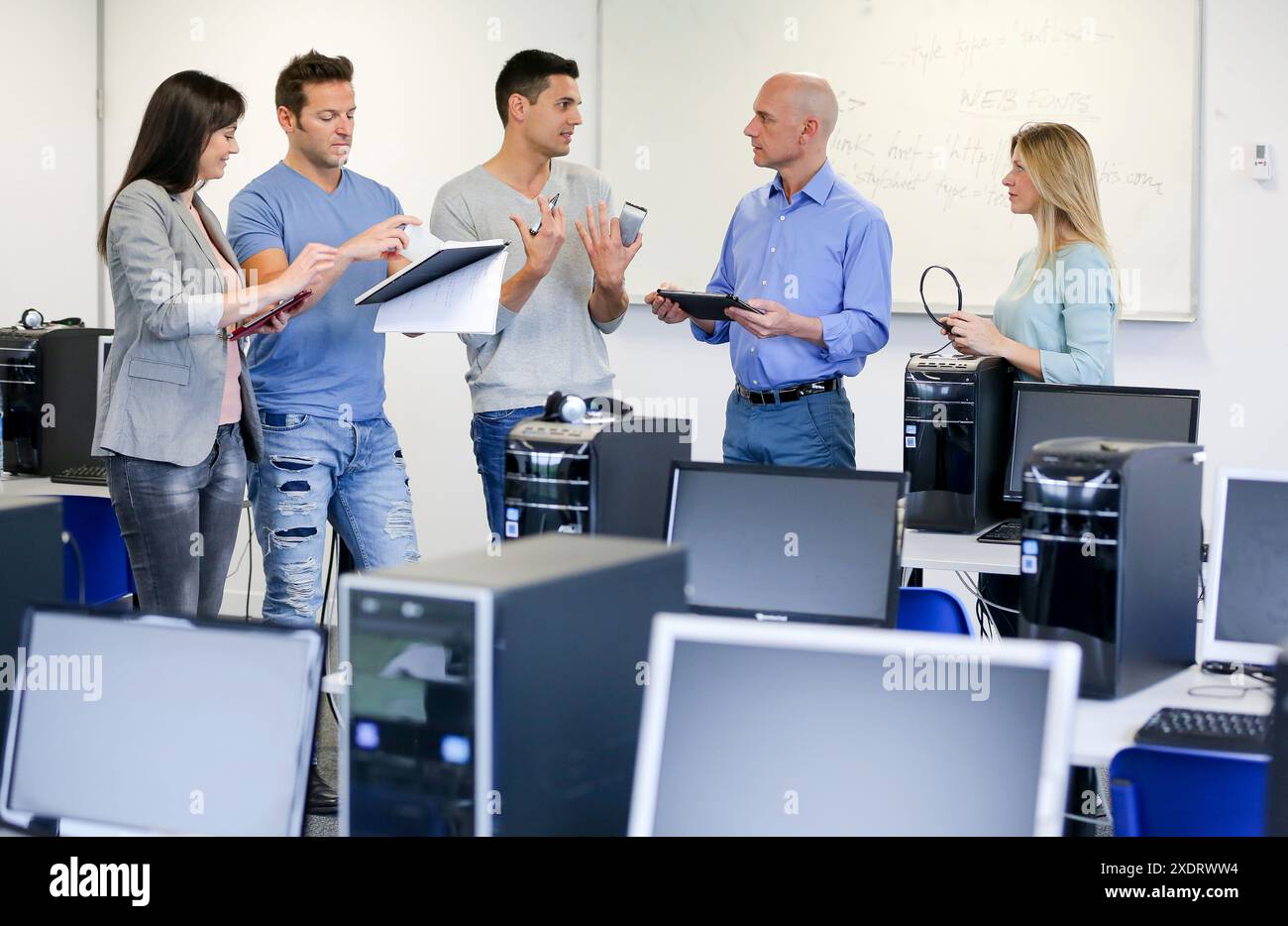 Group of teachers tablet hi-res stock photography and images - Alamy
