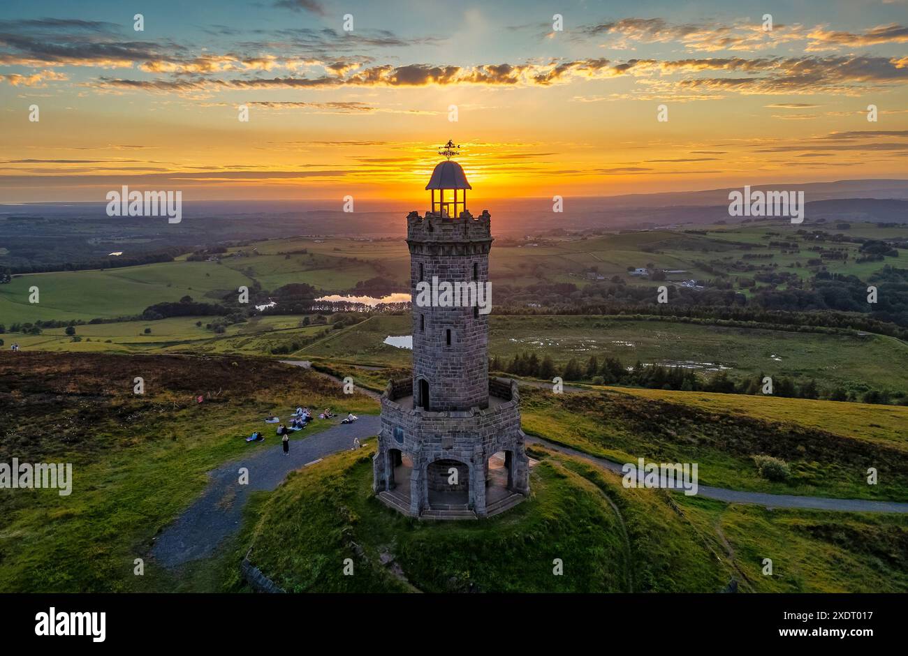 Sunset on Summer Solstice Over Darwen Tower, Lancashire Stock Photo