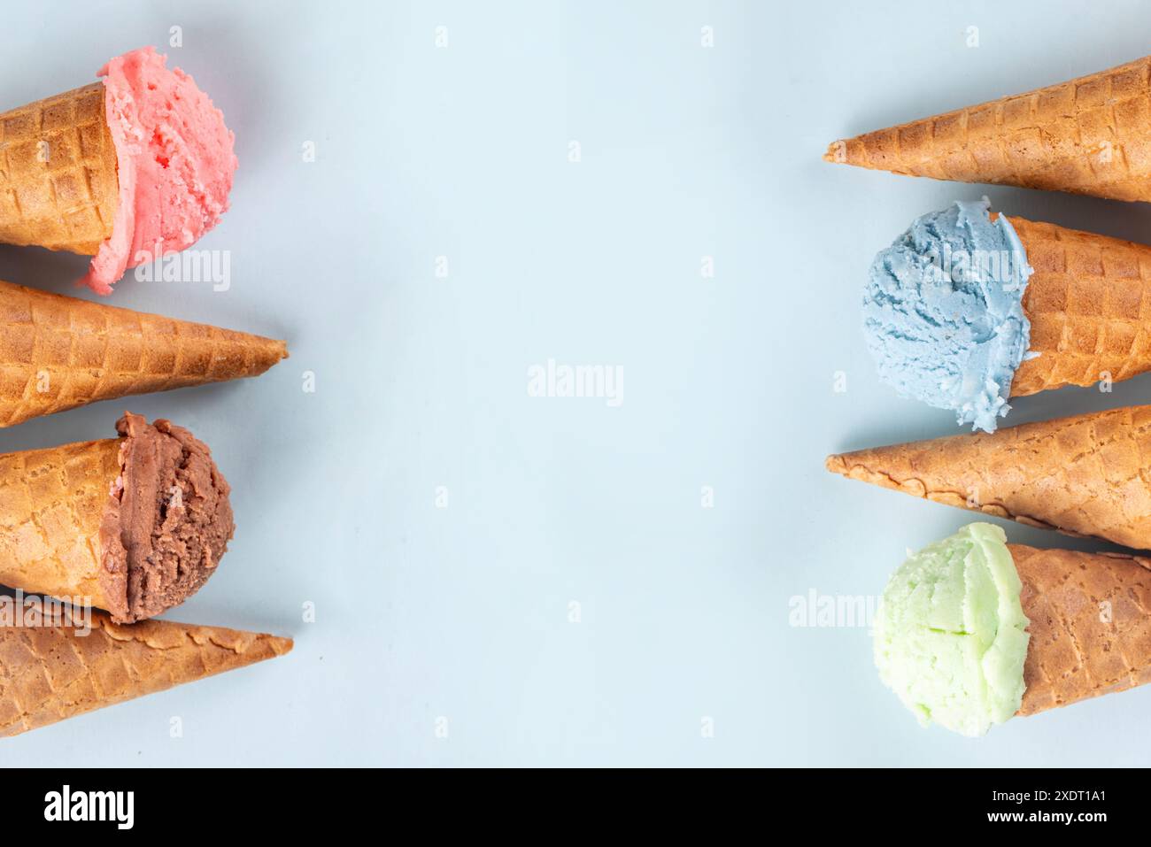 Colorful bright ice cream in waffle cones on bright background. Variety ...