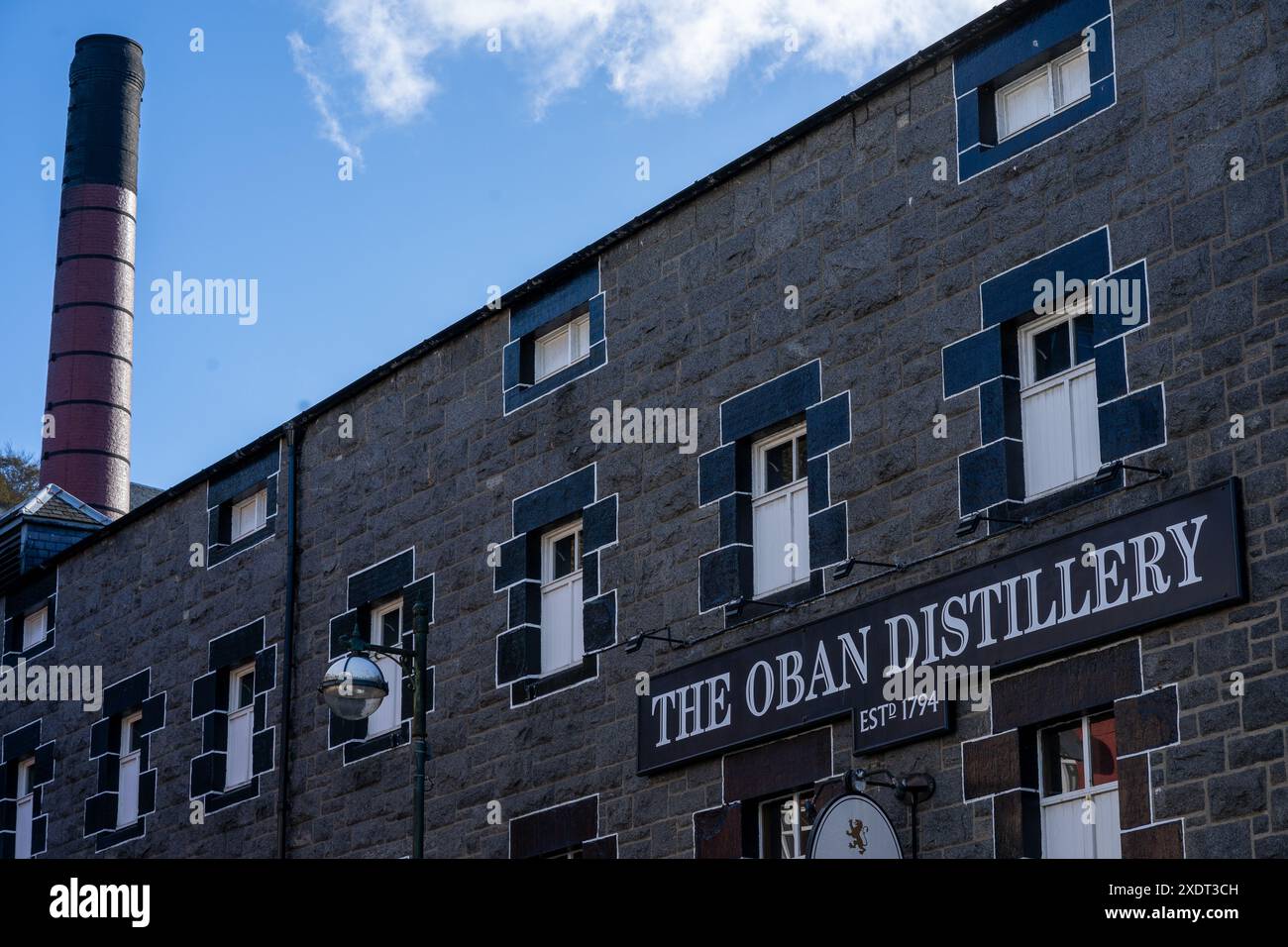 Front facade of the Oban Distillery building, in Oban on the west coast of Scotland.  October 2018 Stock Photo