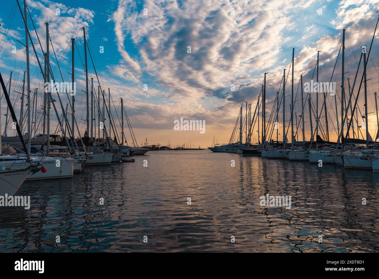 Boats in sunset colors hi-res stock photography and images - Alamy