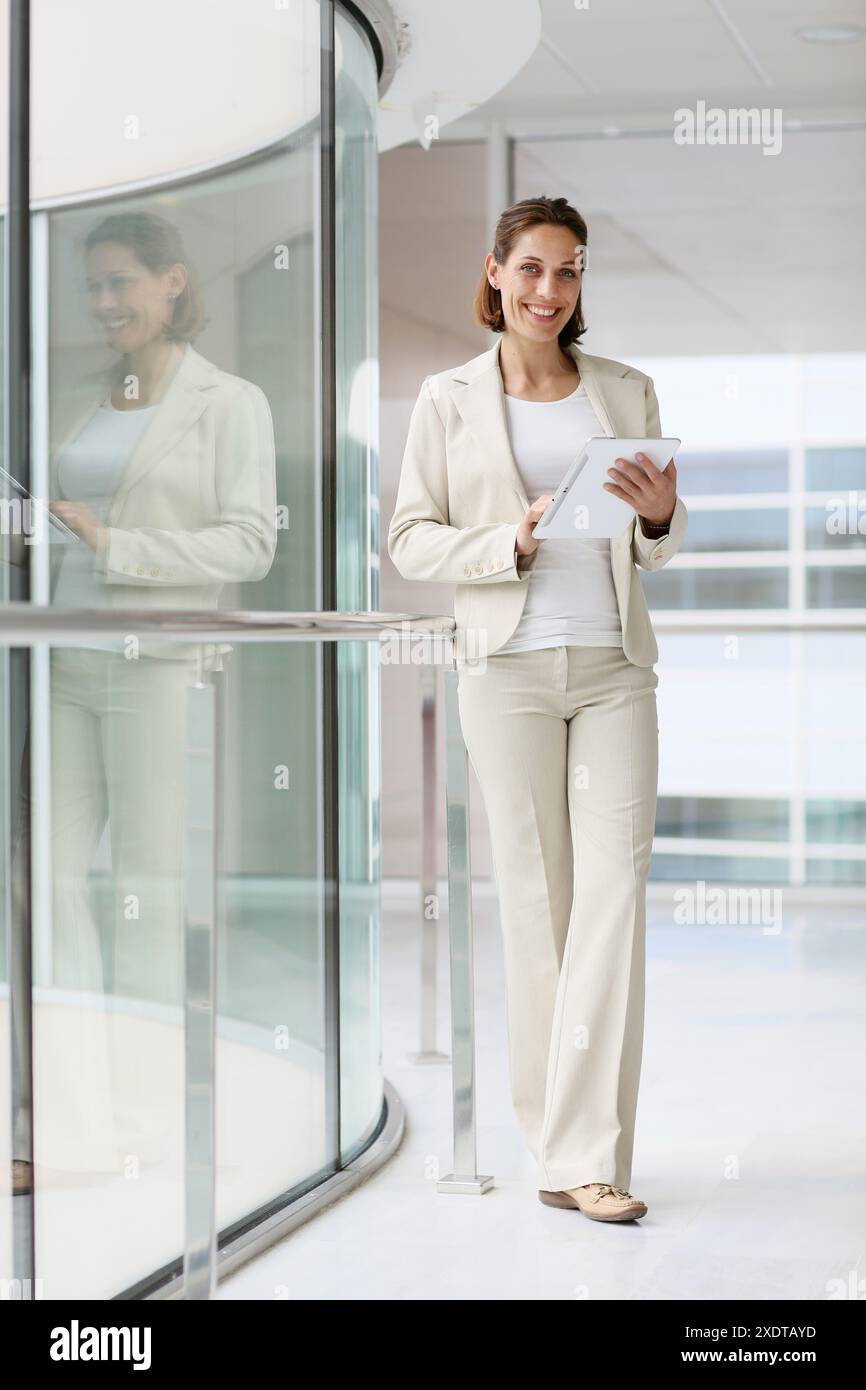 Businesswoman using digital tablet Stock Photo