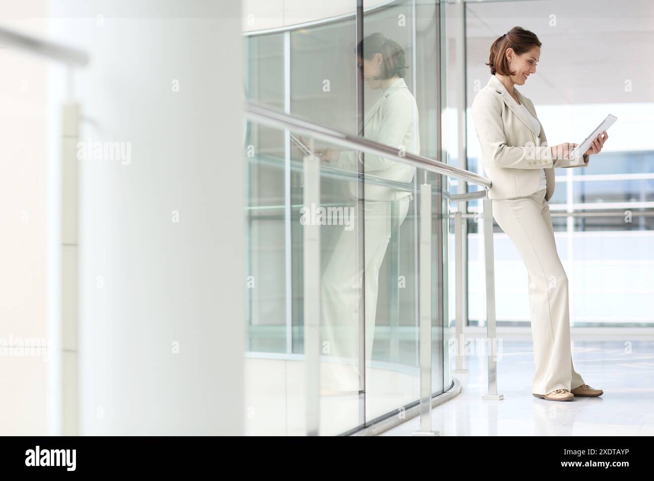 Businesswoman using digital tablet Stock Photo