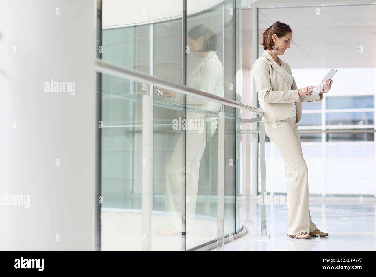 Businesswoman using digital tablet Stock Photo