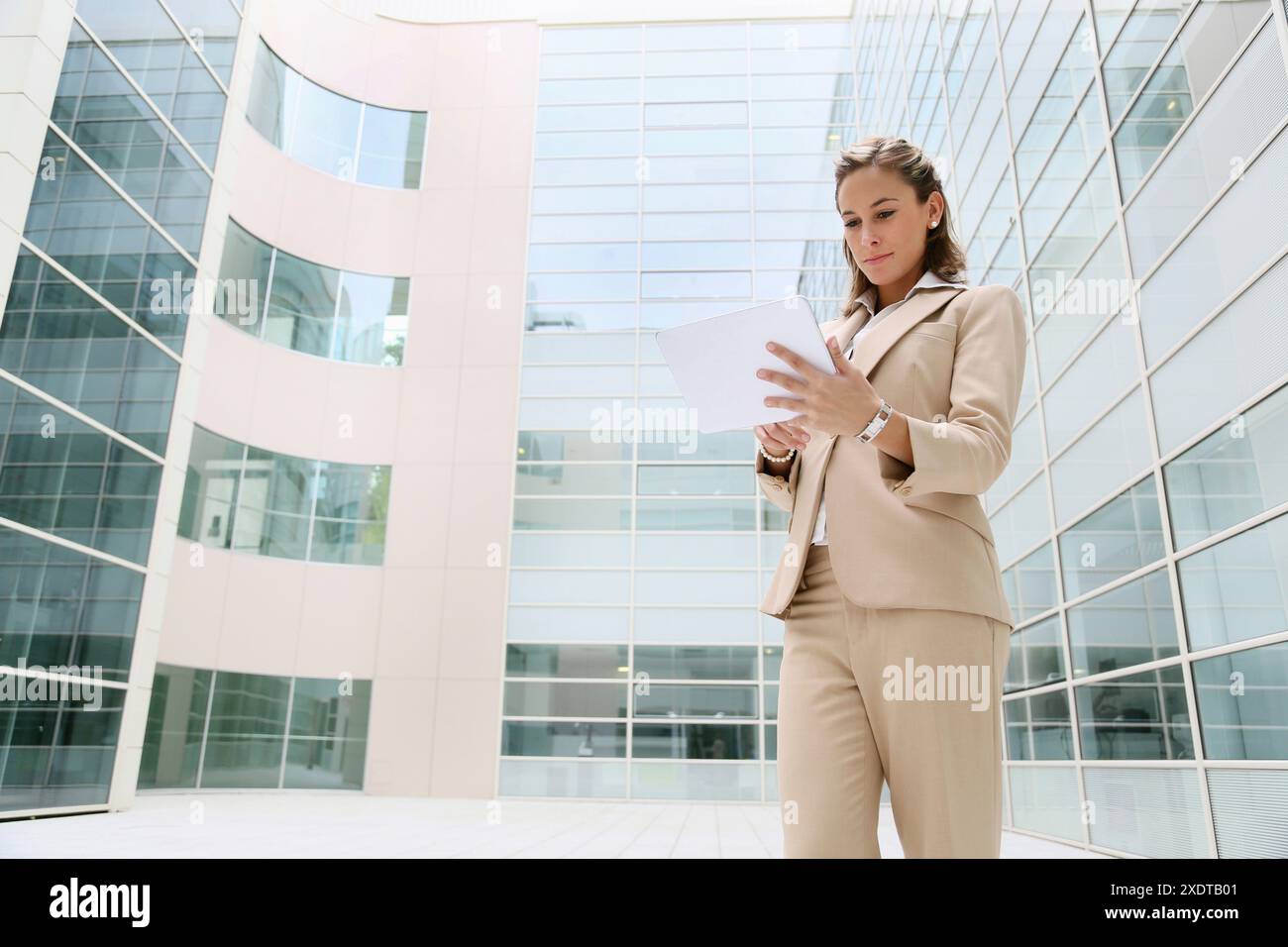 Businesswoman using digital tablet Stock Photo