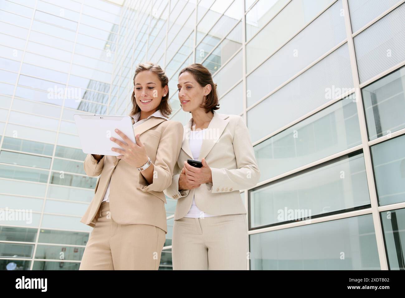 Businesswomen using digital tablet Stock Photo