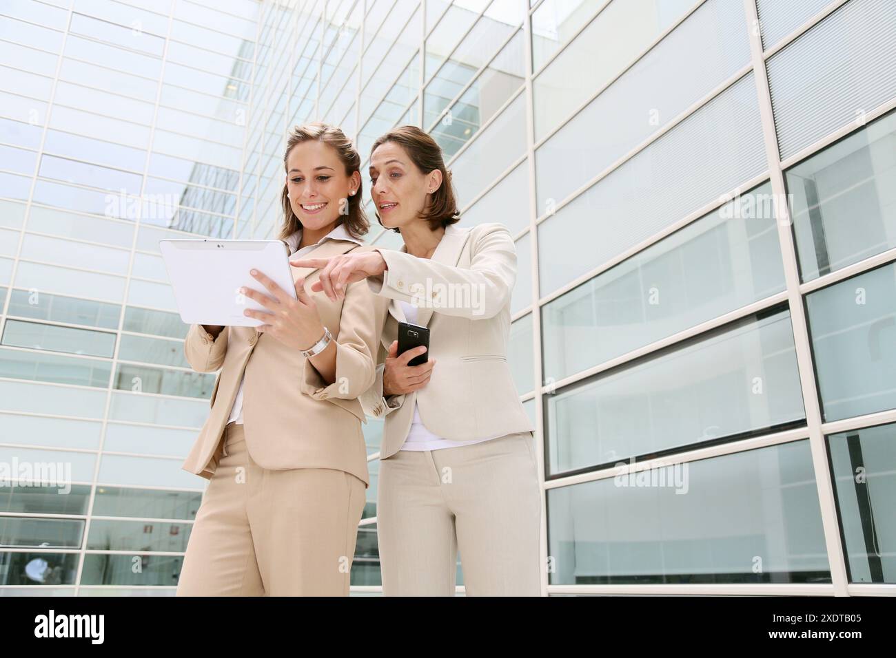 Businesswomen using digital tablet Stock Photo