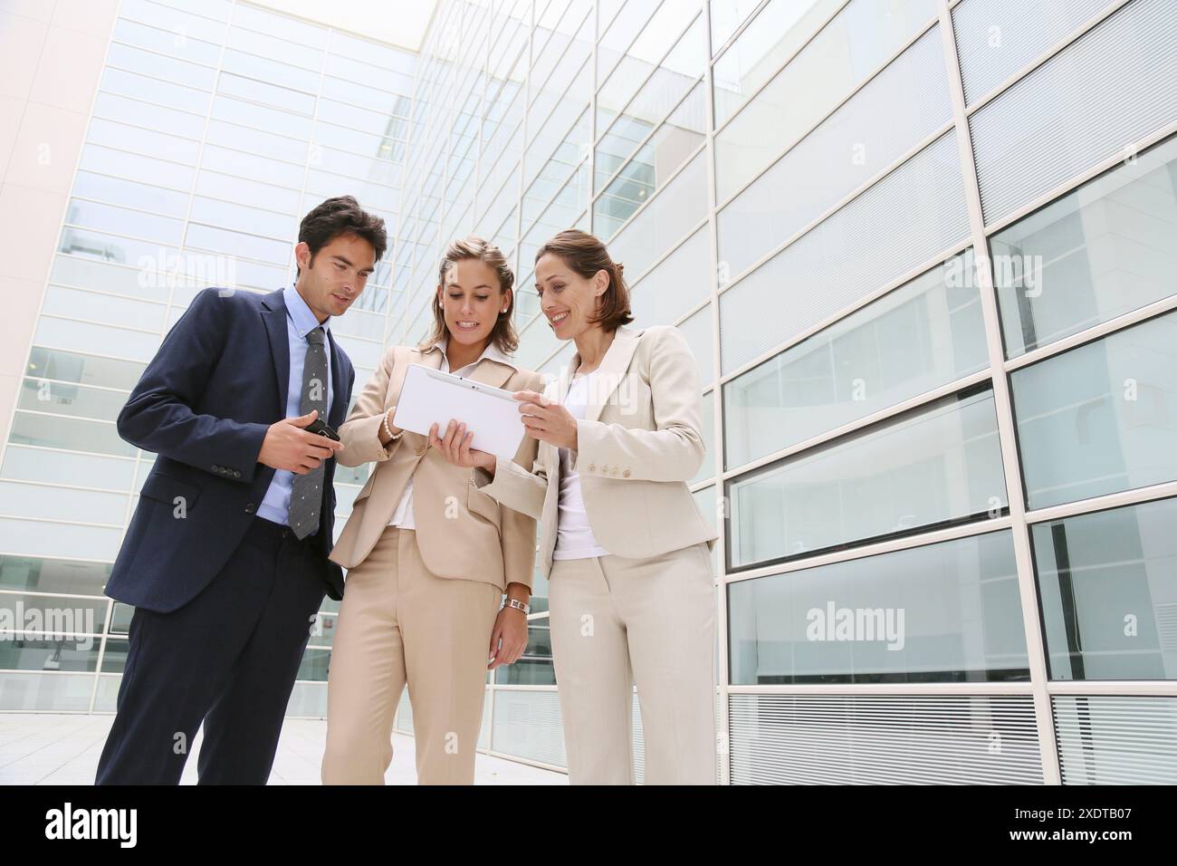 Businesspeople using digital tablet Stock Photo