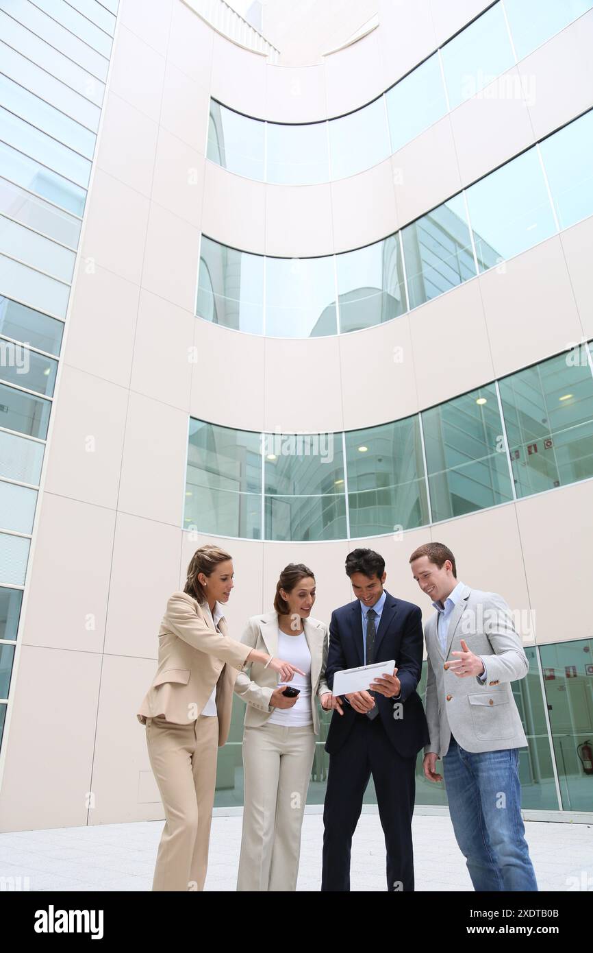 Businesspeople using digital tablet Stock Photo
