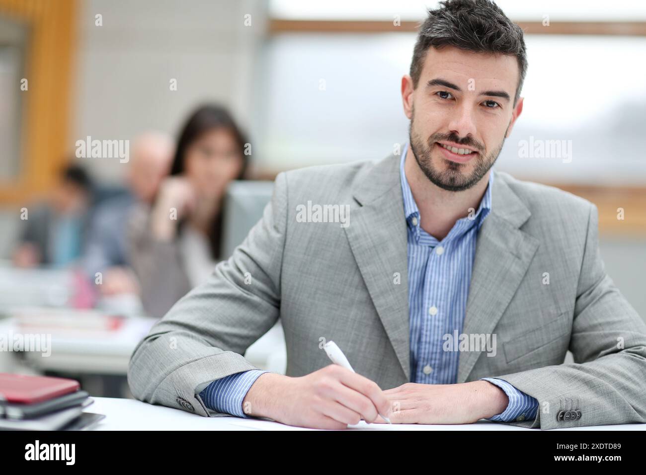 Businessman taking notes Stock Photo