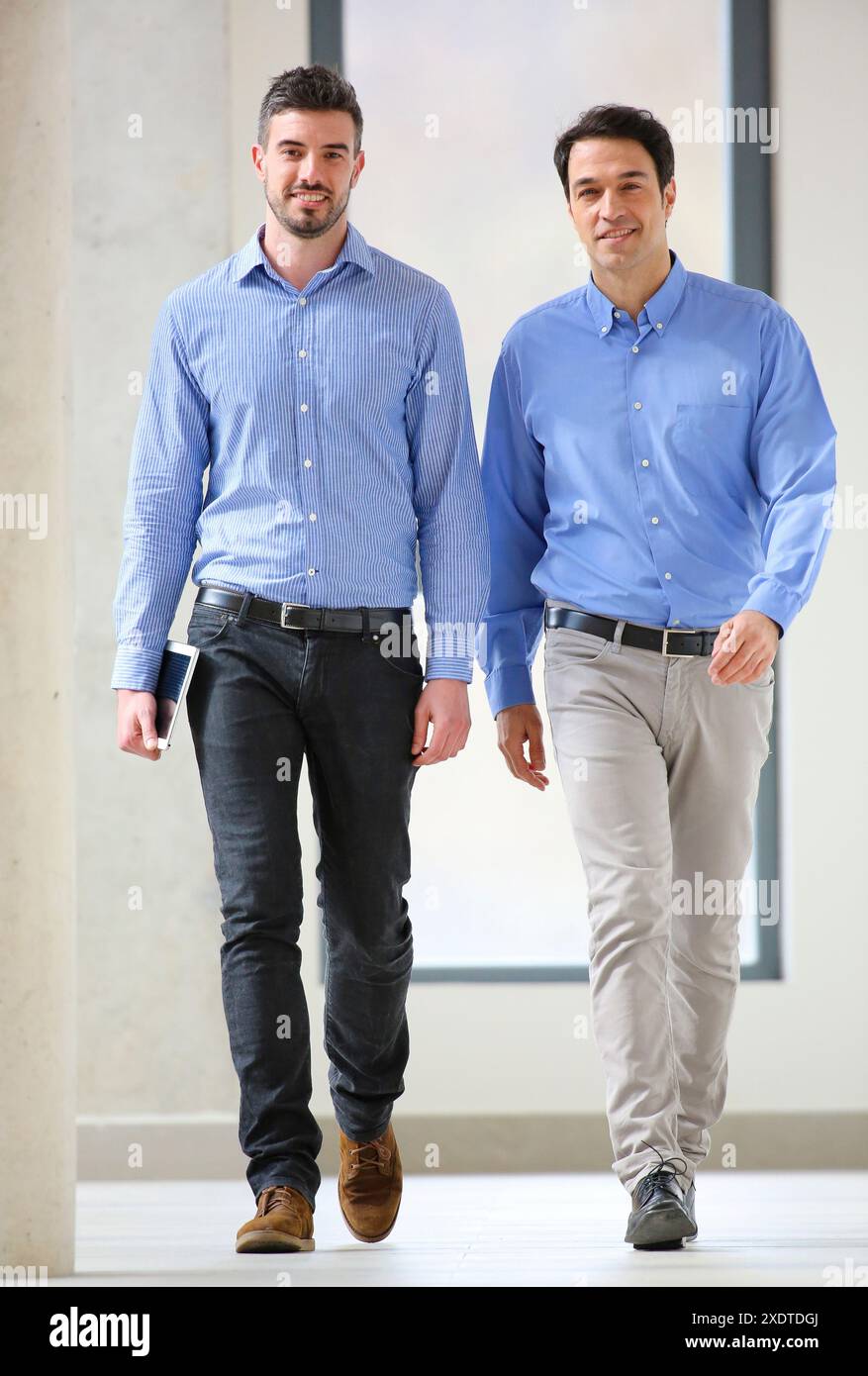 Two executives walking Stock Photo
