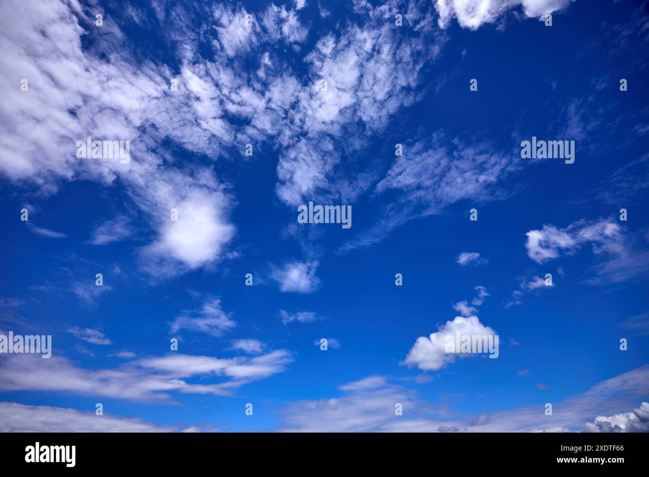 Blue sky background with white clouds at sunny day Stock Photo - Alamy