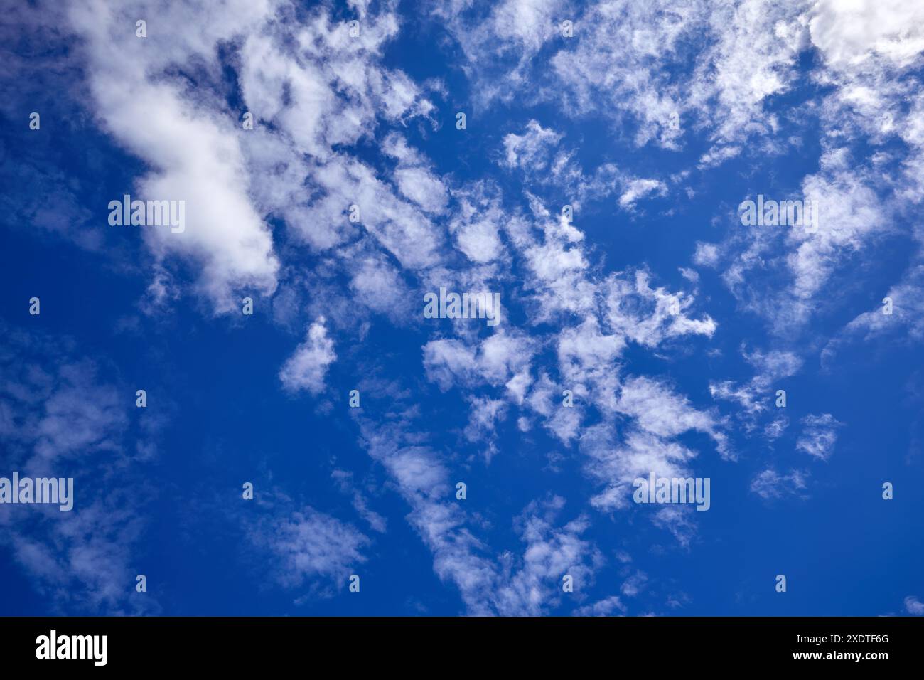 Blue sky background with white clouds at sunny day Stock Photo - Alamy