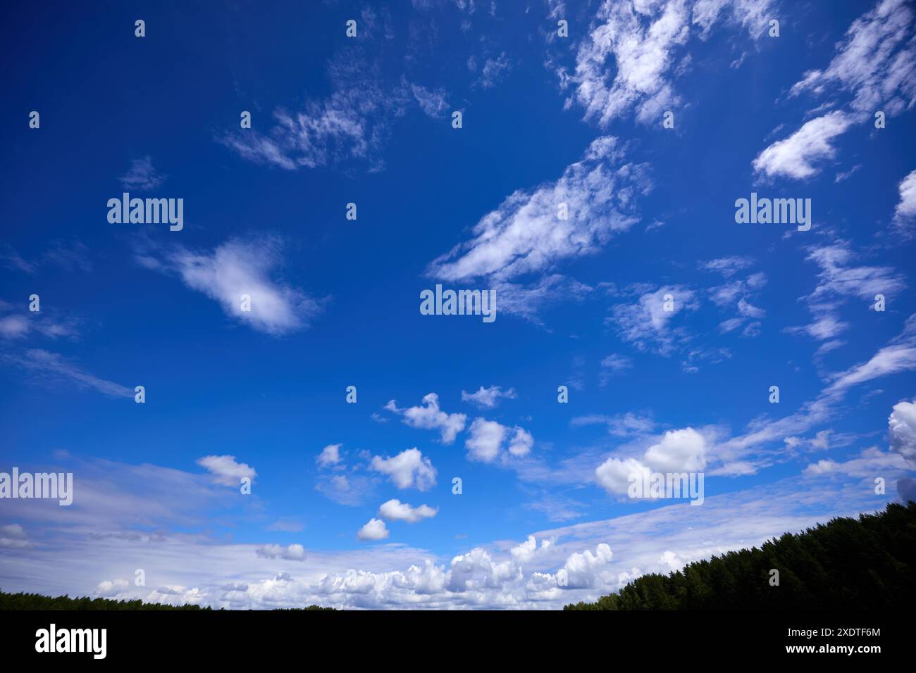 Blue sky background with white clouds at sunny day Stock Photo - Alamy