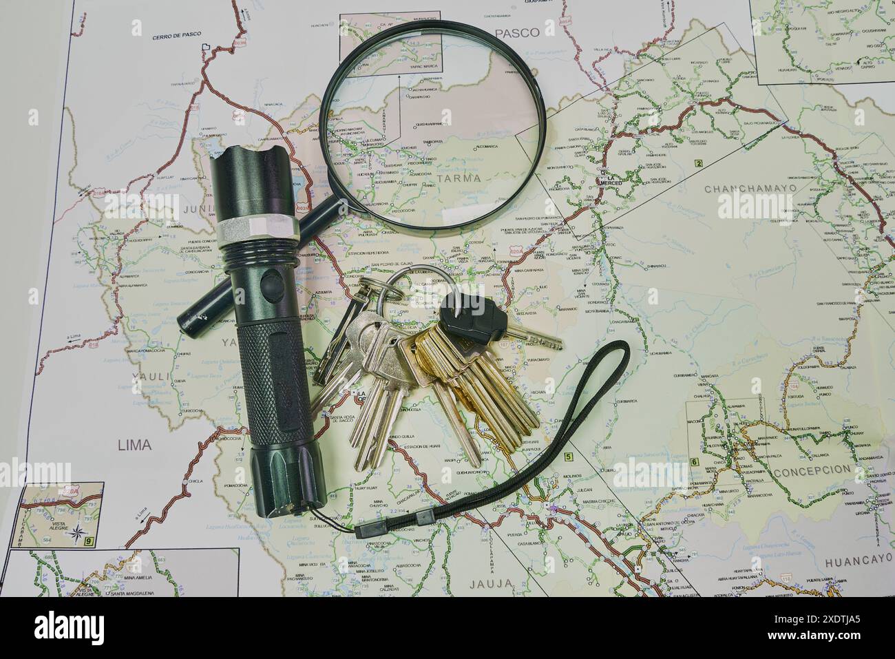 Map, flashlight, magnifying glass, keys. Trip planning to the central ...