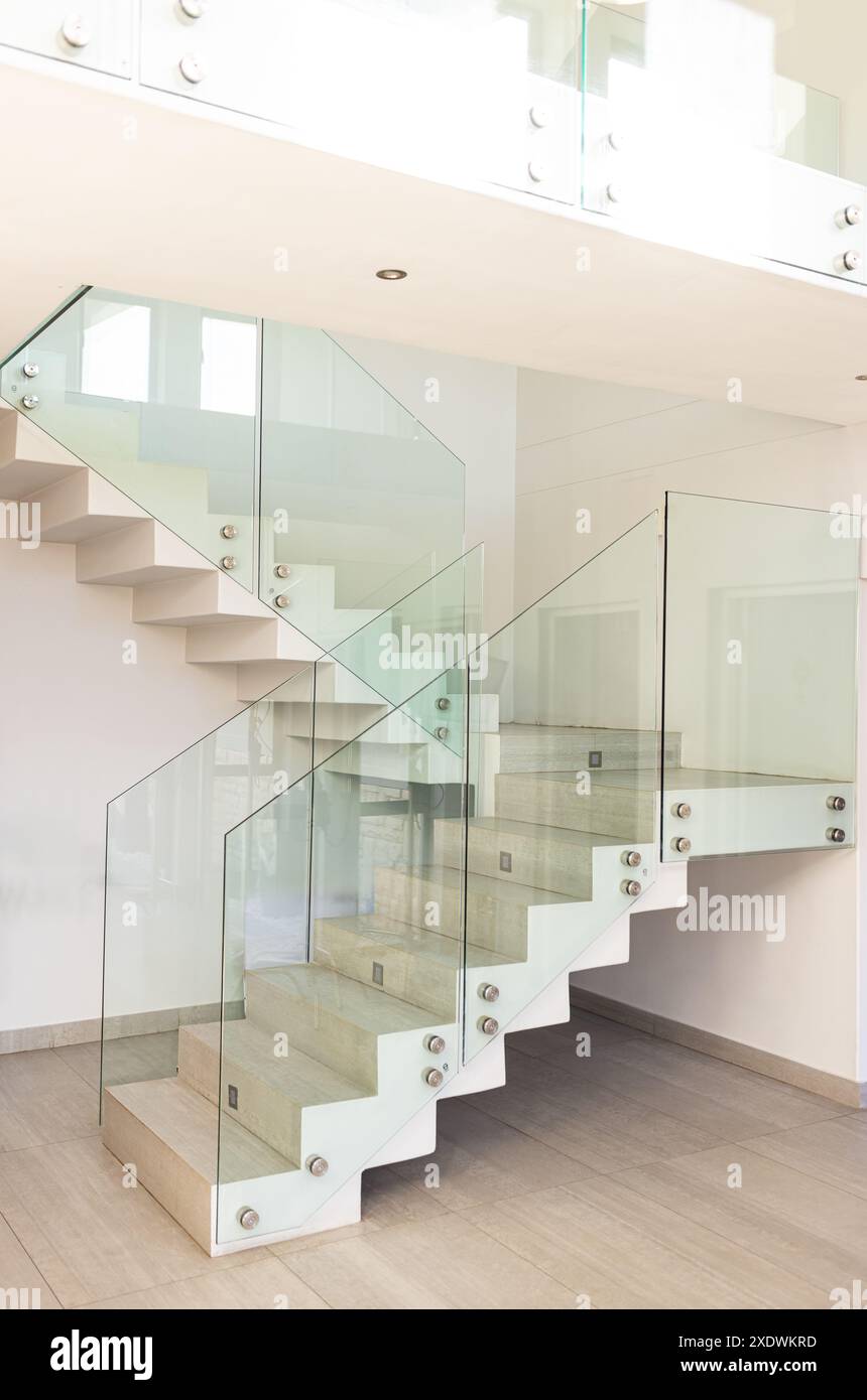 Gallery Detail: Modern Glass Staircase With Metal Accents In Contemporary Home Interior