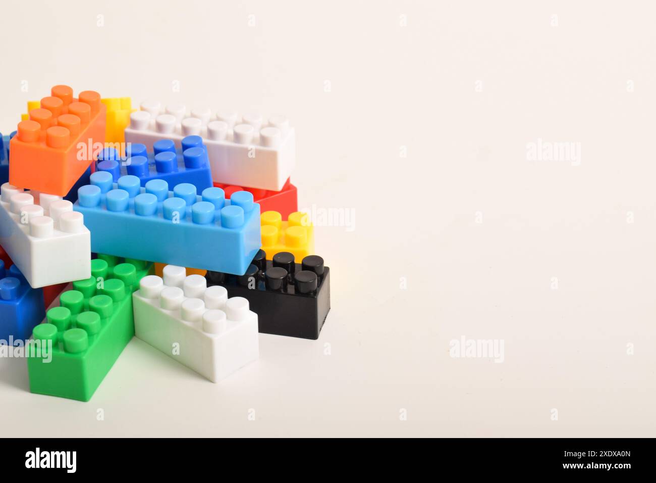 Pile of Colorful Plastic toy blocks isolated on white background Stock ...
