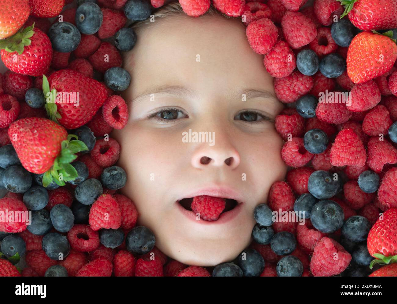 Healthy eating for children. Berries mix of strawberry, blueberry ...