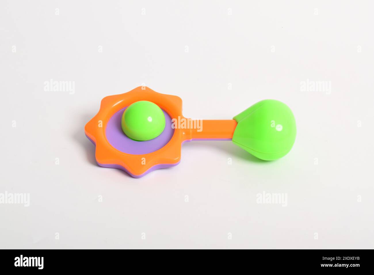 Closeup baby girl playing rattle hi-res stock photography and images ...