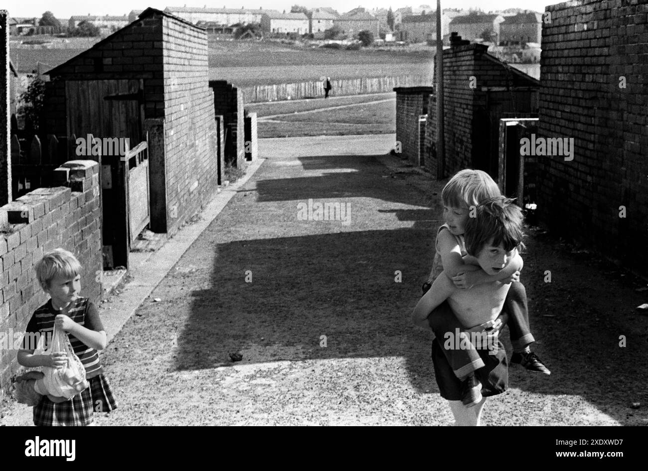 Back Rane Pichers Children playing in the 'back lane' or 'back alley' a traffic free road ...