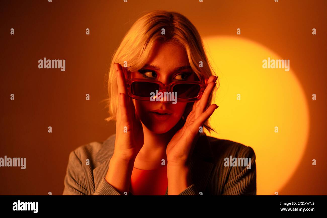 Person wearing bright blue hi-res stock photography and images - Alamy