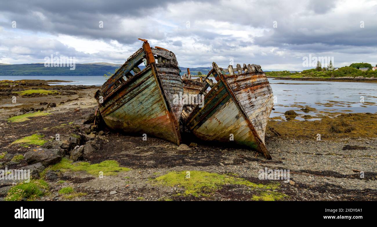 Old shipwrecked wooden fishing boats on the Isle of Mull Stock Photo ...