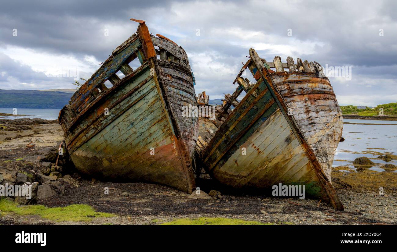 Old shipwrecked wooden fishing boats on the Isle of Mull Stock Photo ...