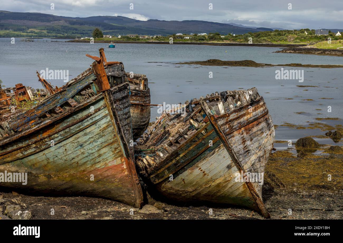 Old shipwrecked wooden fishing boats on the Isle of Mull Stock Photo ...
